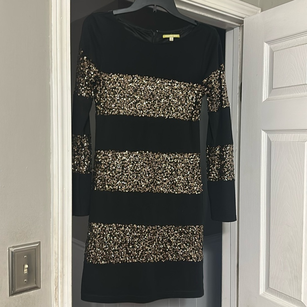 Black and gold sequin dress.